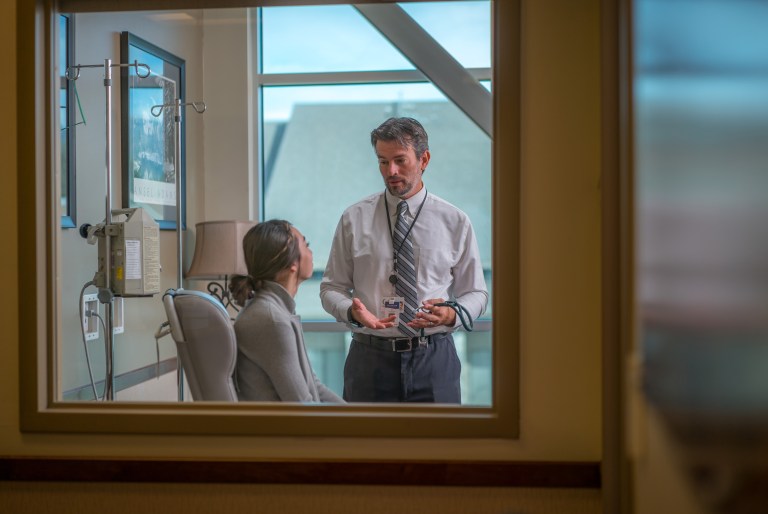 Doctor talking to his patient